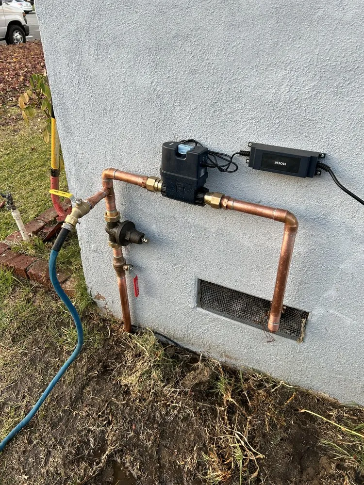 Slide of Dynamo Plumbing & Drain Cleaning