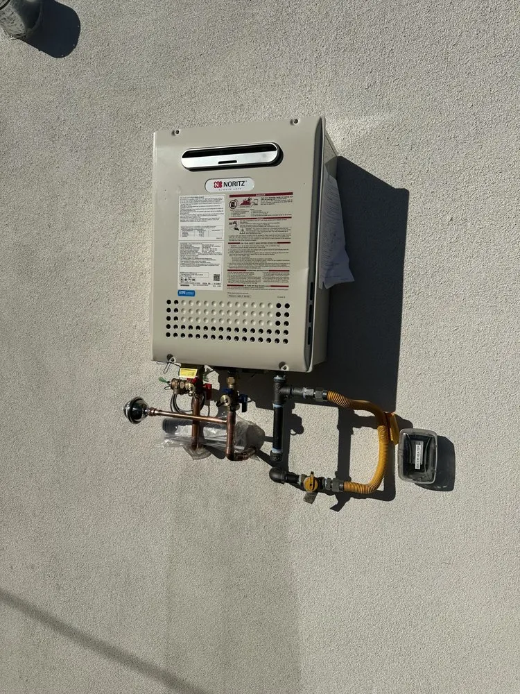 Slide of E & M Plumbing