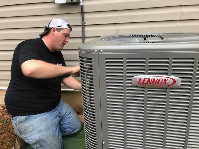 Slide of E. Dennis Heating, Cooling, Plumbing & Electrical