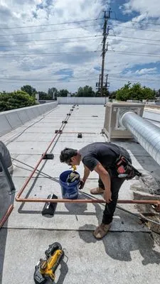 E-M.O.Z Plumbing Logo