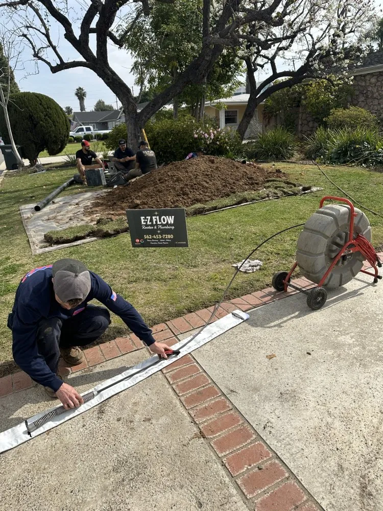 Slide of E-Z Flow Rooter & Plumbing