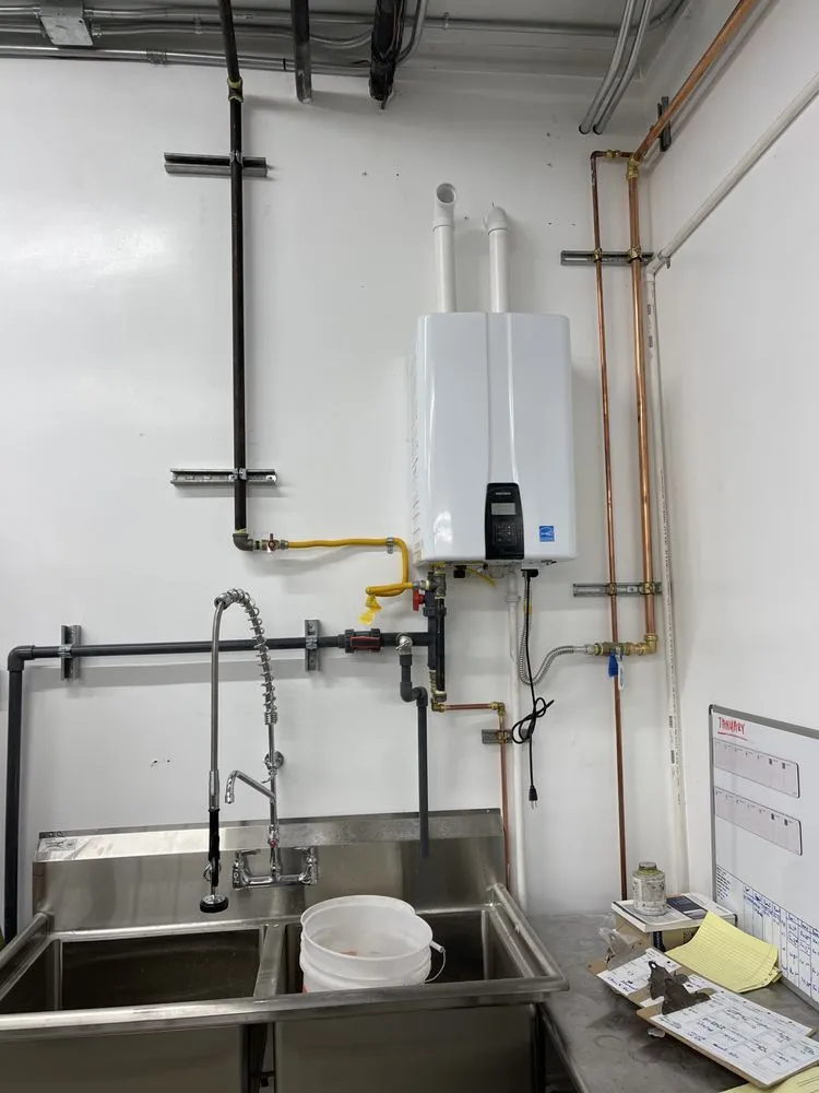 Slide of E&C plumbing services