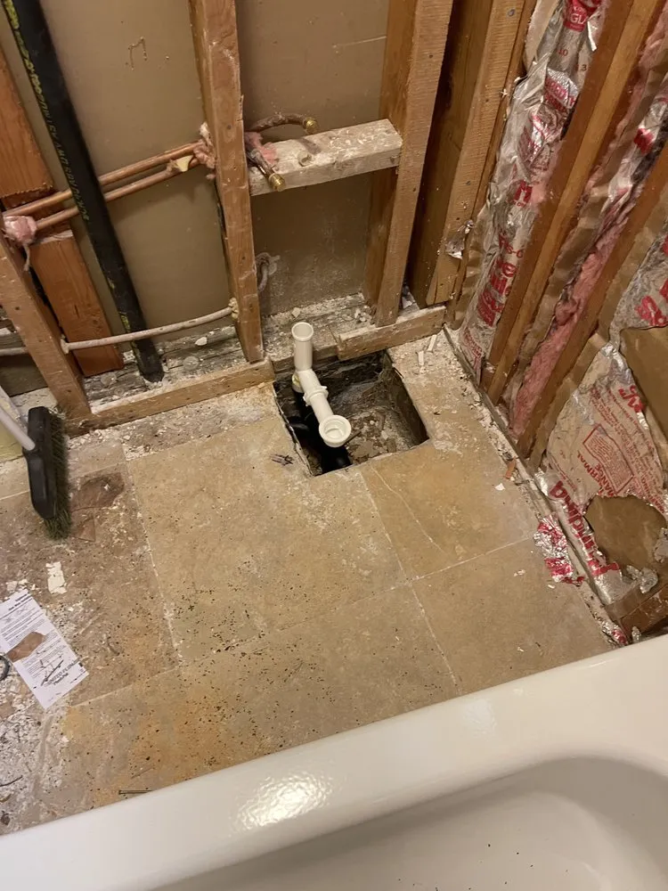 Slide of E&C plumbing services