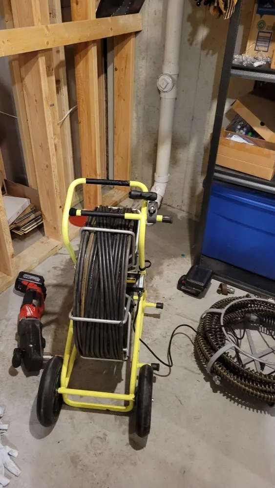 Slide of ED's Drain Cleaning