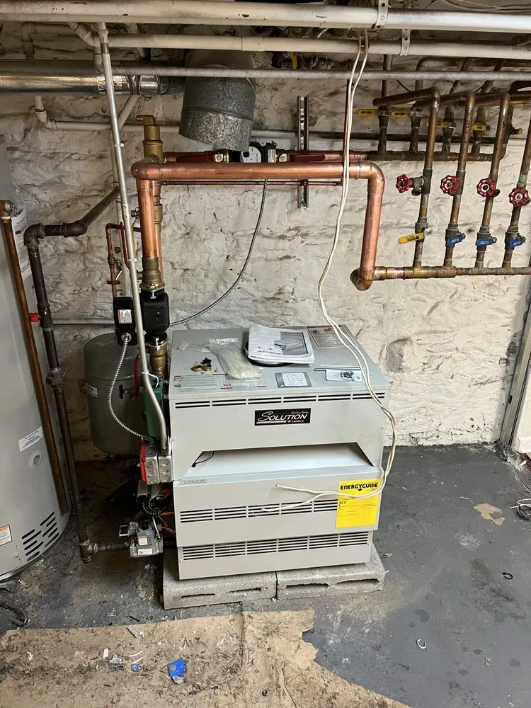 Slide of Elite Plumbing and Heating