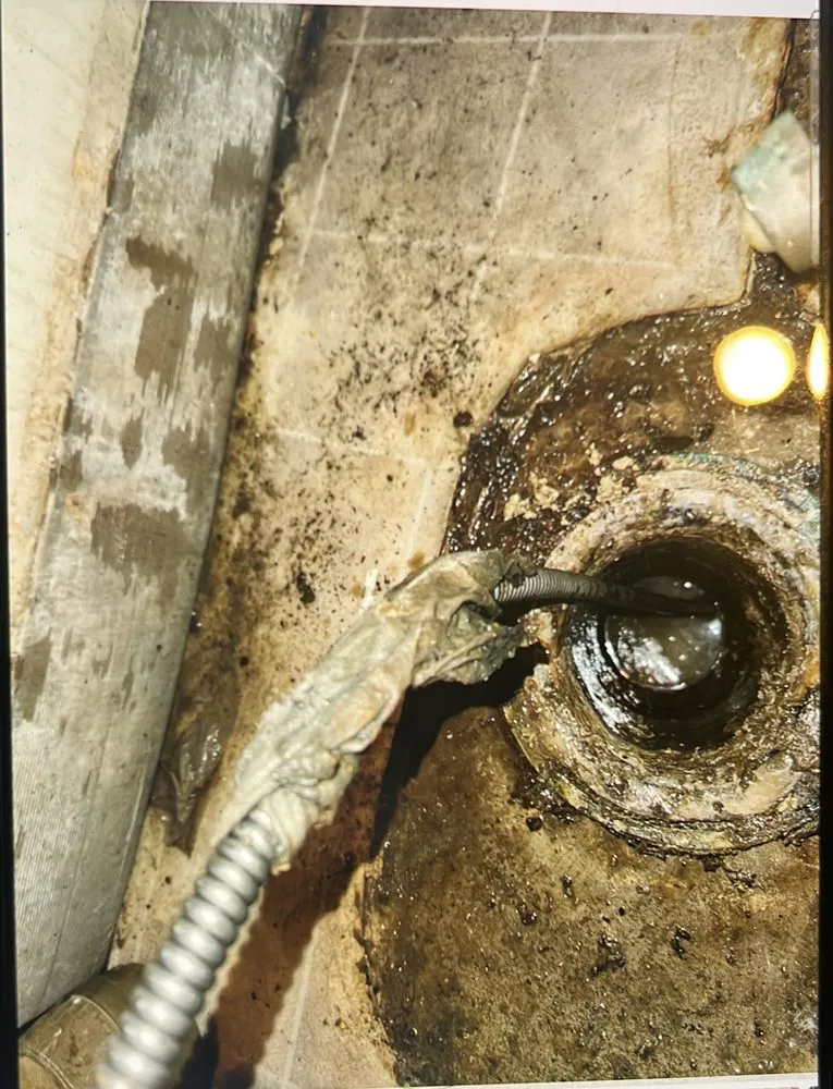 Slide of EliteFlow Drain Cleaning Services