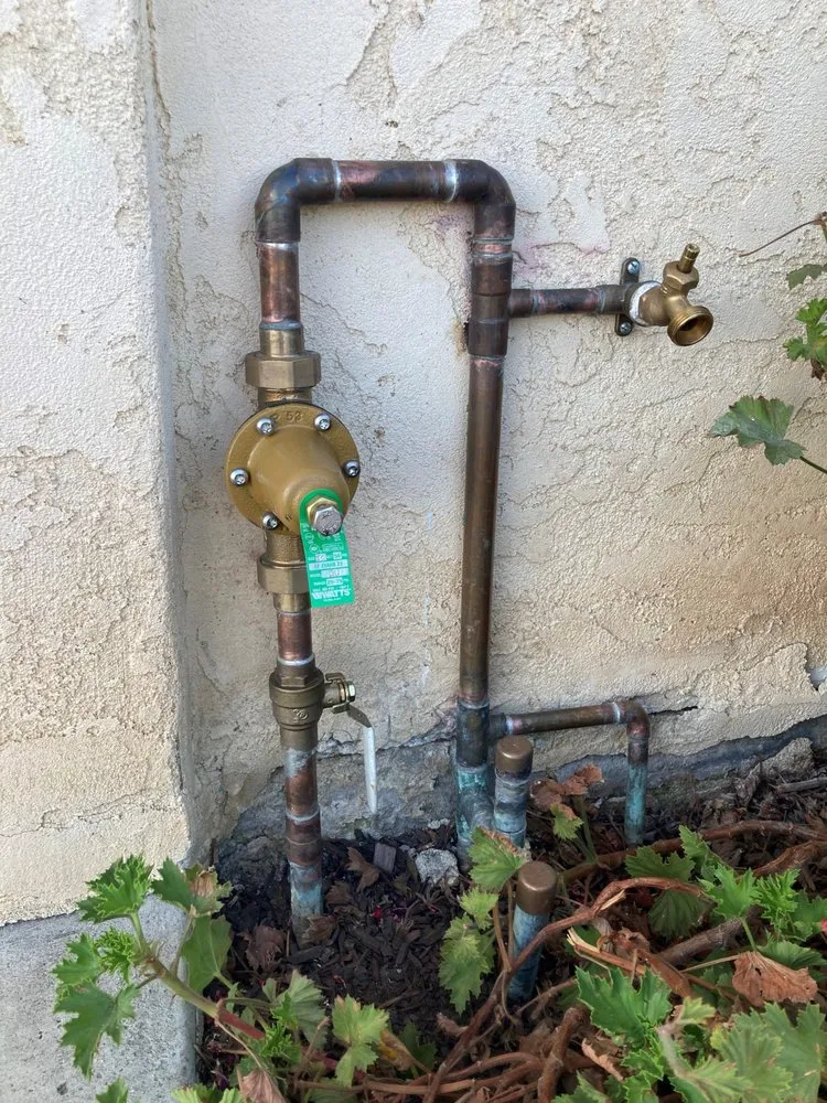 Slide of Elken Plumbing Contractors