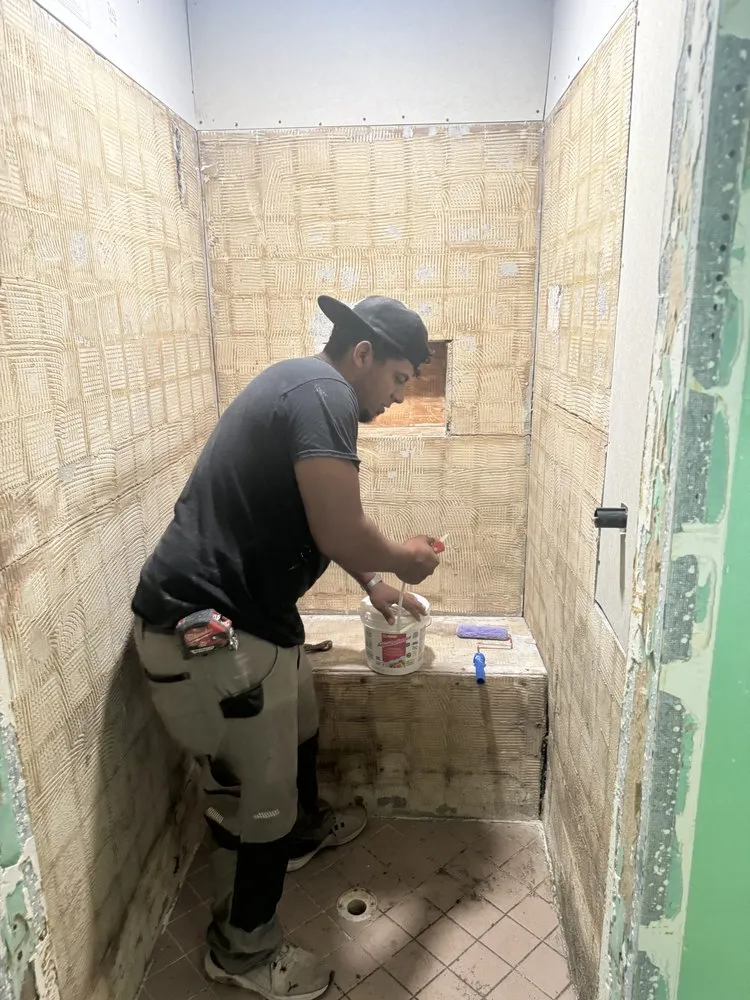 Slide of Em Home Remodeling