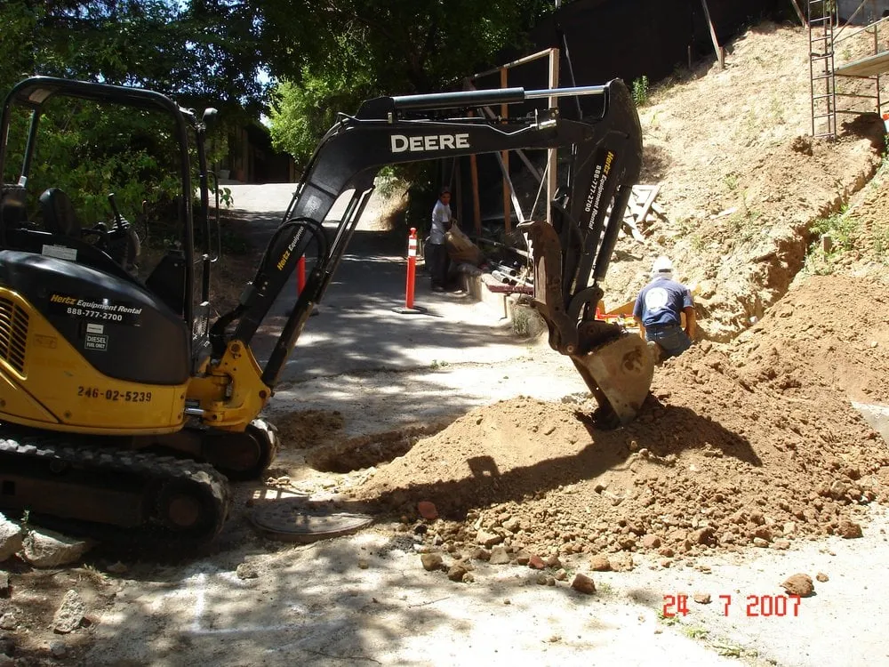 Slide of ER Plumbing & Construction