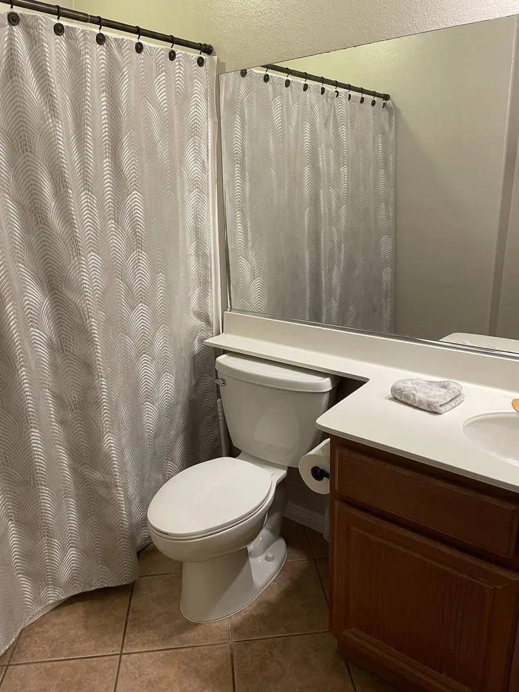 Slide of Ernie's Discount Rooter Service