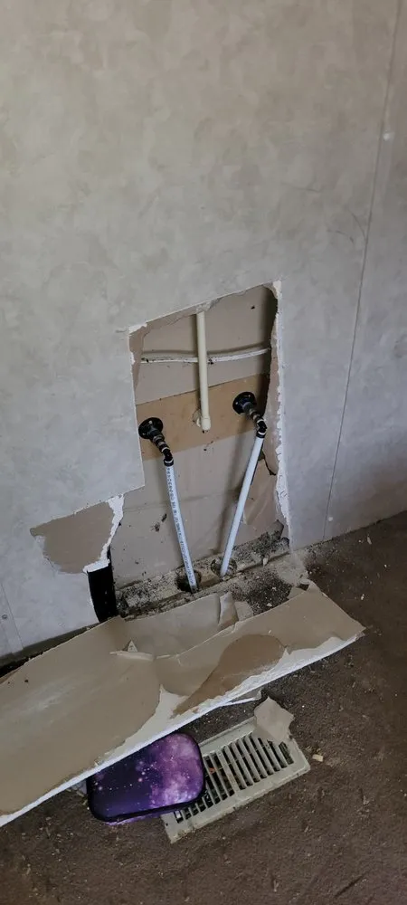 Slide of Ernie's Plumbing Service