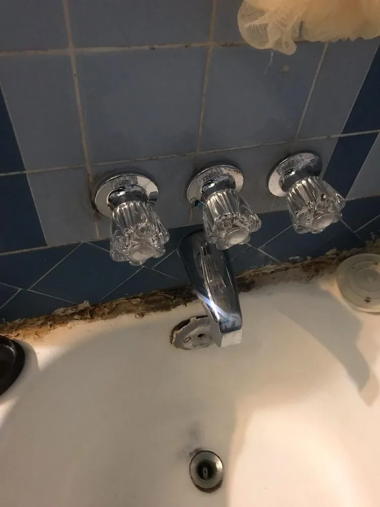 Slide of Ernie's Plumbing Service