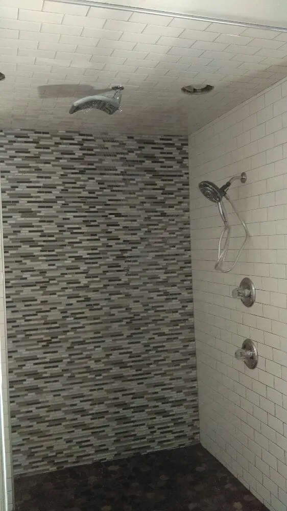 Slide of Everyone's Plumbing & Handyman Services