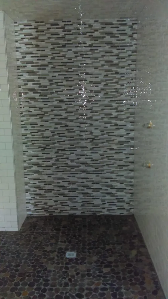 Slide of Everyone's Plumbing & Handyman Services