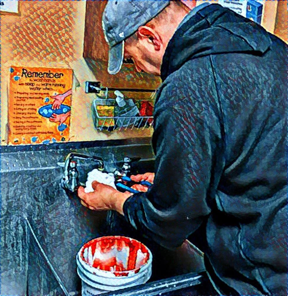 Slide of EW Tompkins Plumbing Heating Cooling