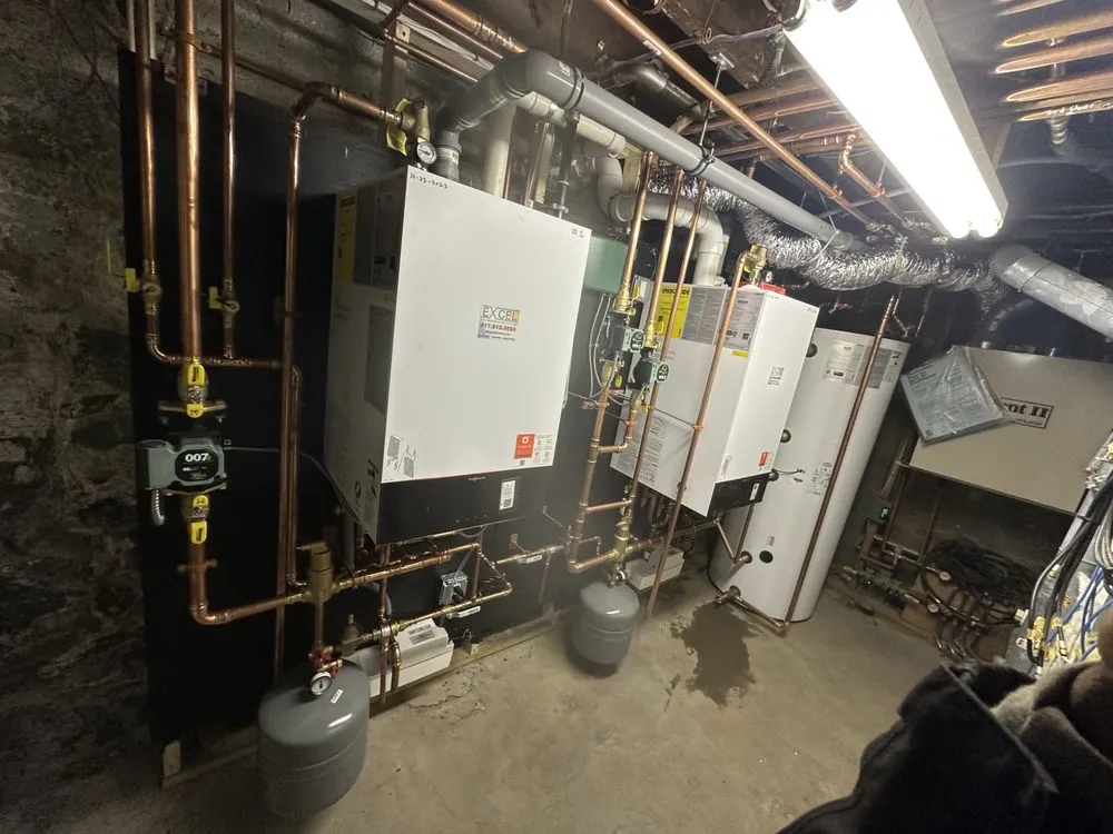 Slide of Excel Plumbing and Heating