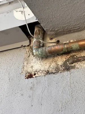 Exquisite Handyman Services Logo