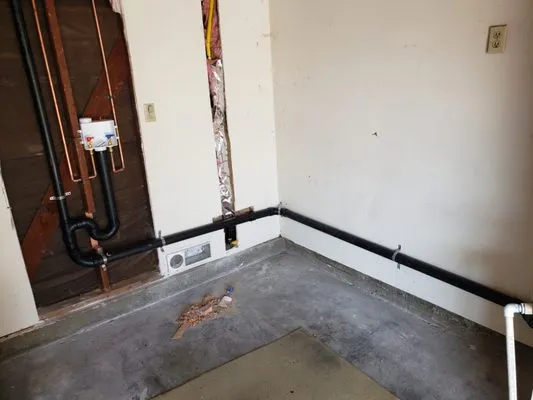 Extraordinary Plumbing Logo