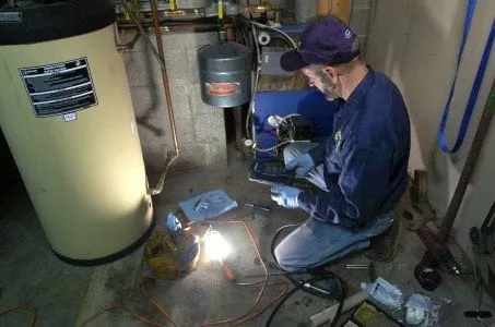 Slide of EZ Plumbing and Heating