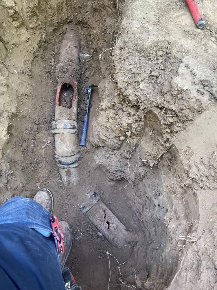 Slide of EZ Sewers Rooter and Plumbing