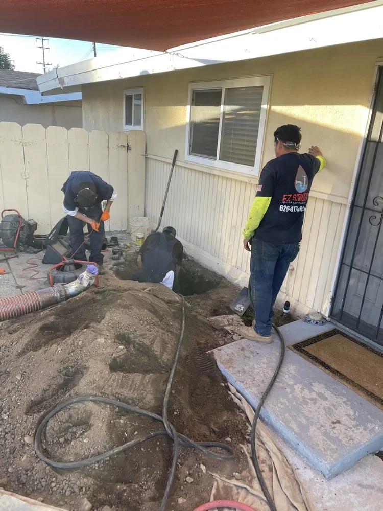 Slide of EZ Sewers Rooter and Plumbing