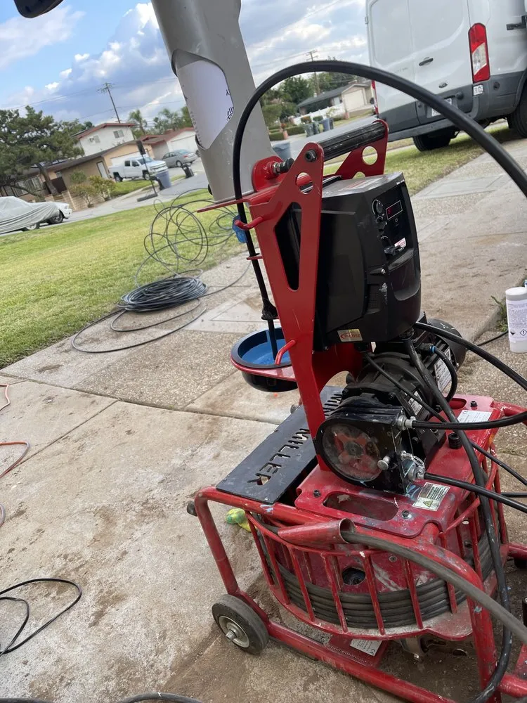 Slide of EZ Sewers Rooter and Plumbing