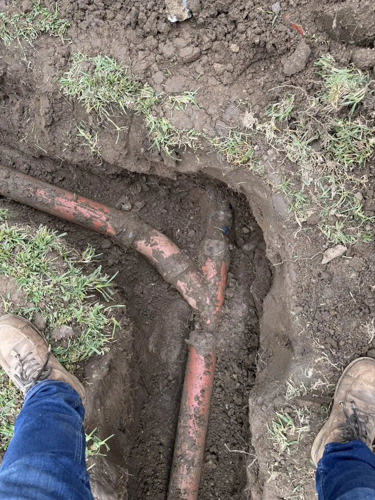 Slide of EZ Sewers Rooter and Plumbing