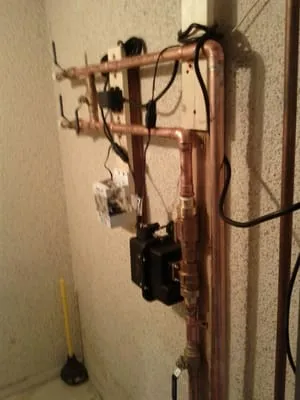 Famer Construction & Plumbing Logo