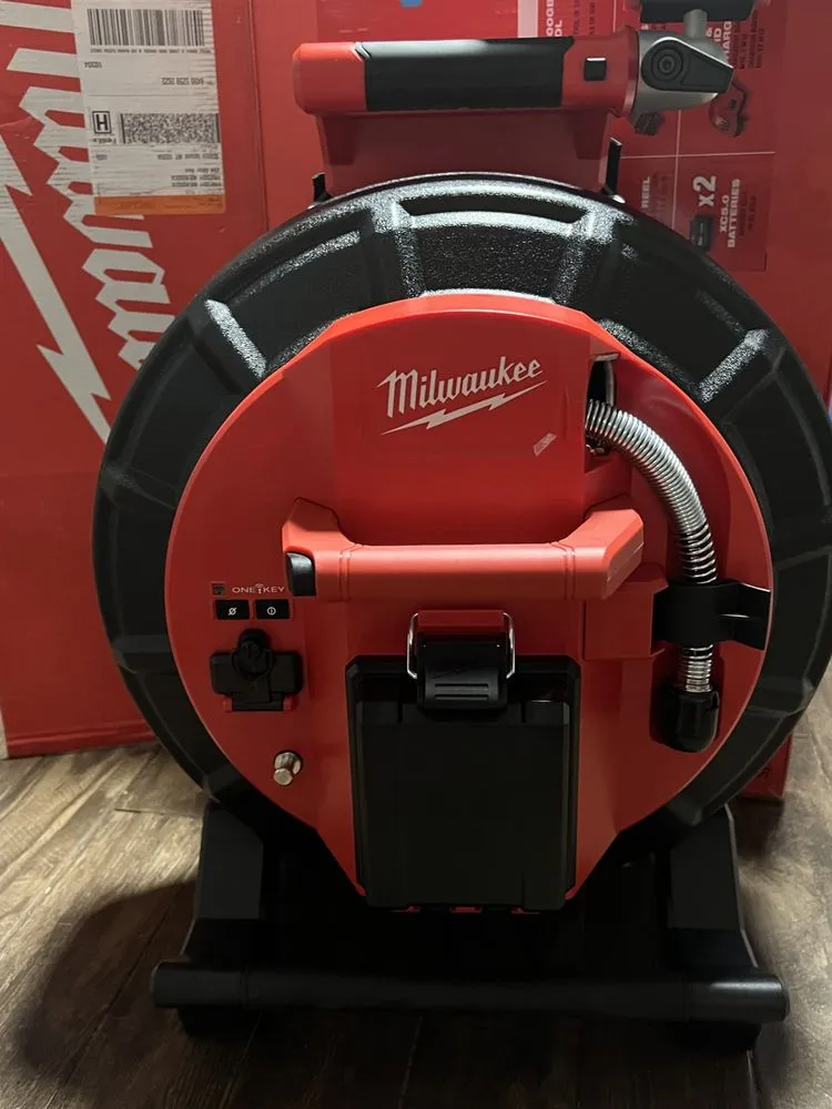 Slide of Family Drain Cleaning