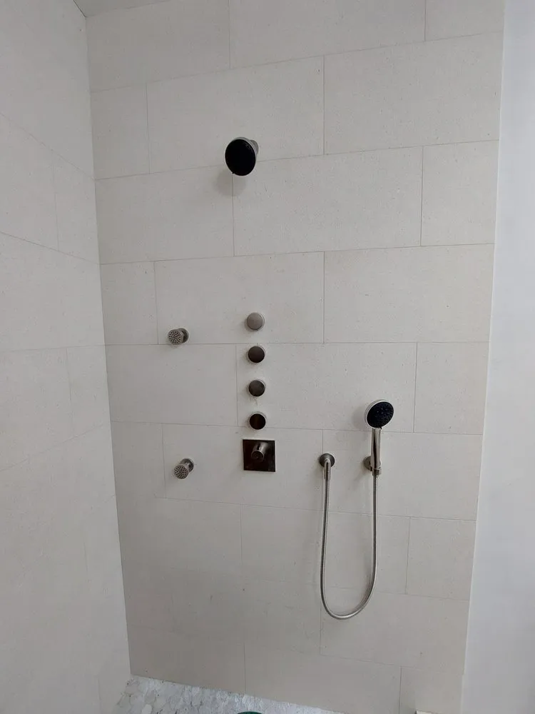 Slide of Family Drain Cleaning