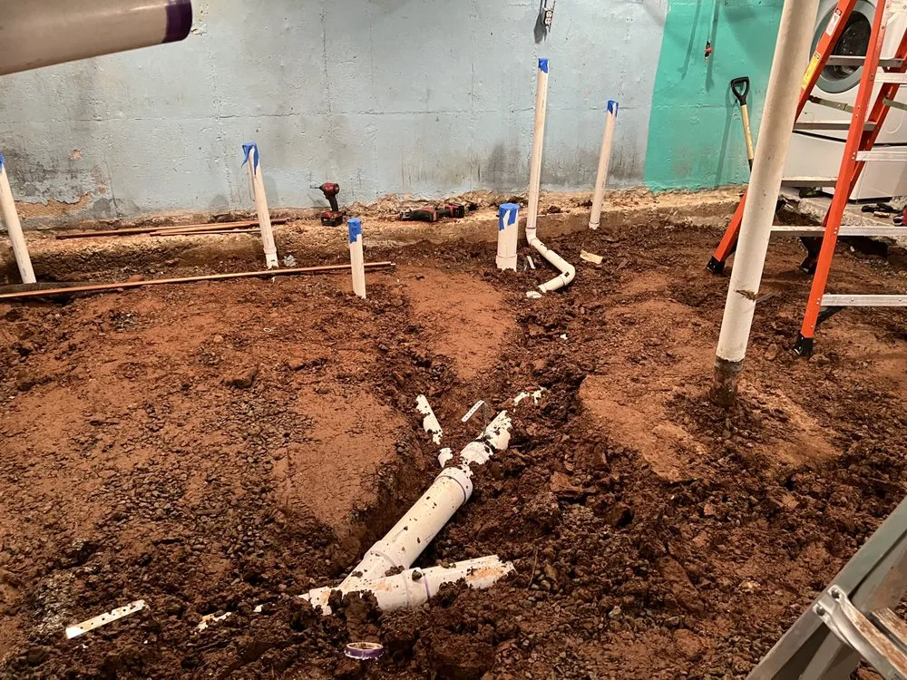 Slide of Family Drain Cleaning