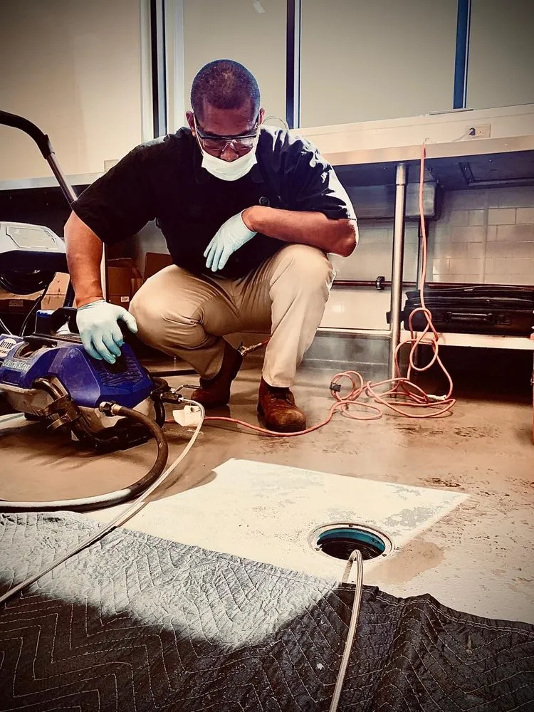 Slide of Family Drain Cleaning