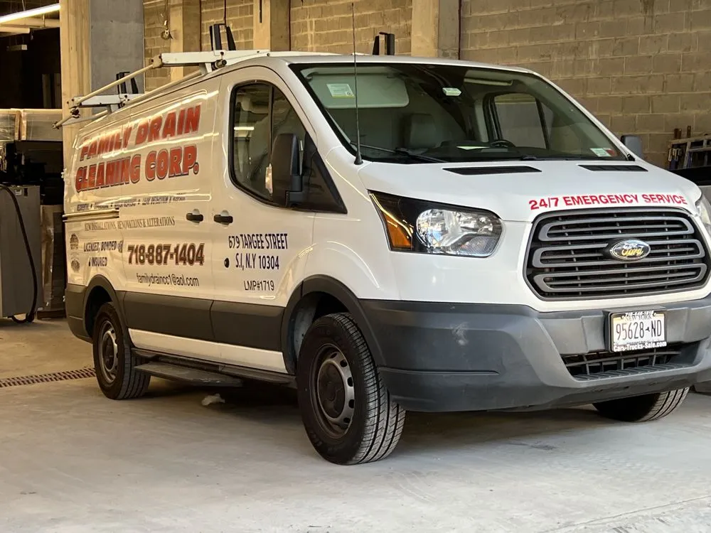 Slide of Family Drain Cleaning