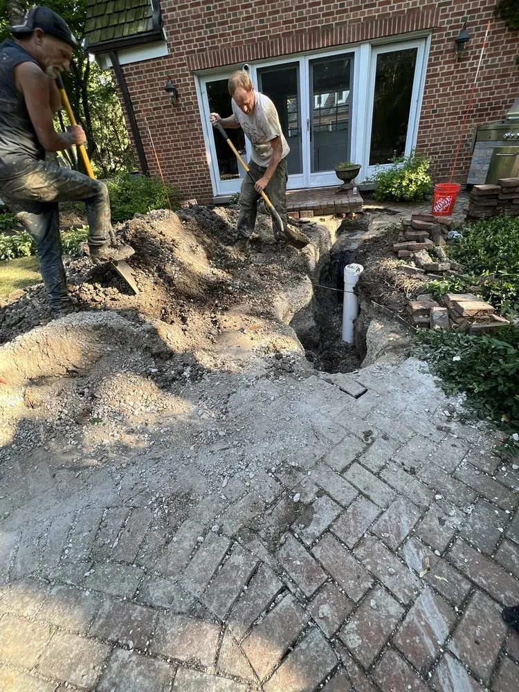 Slide of Family Rooter Drain & Sewer