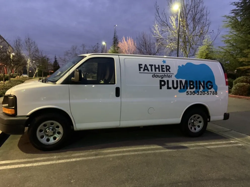 Slide of Father Daughter Plumbing
