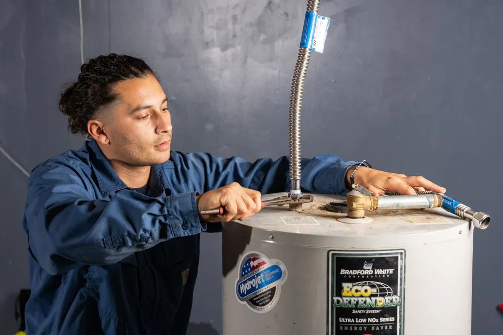 Trusted water heater service for homes in Riverside, CA by First Class Plumbing and Rooter
