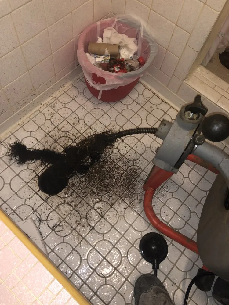 Slide of FM Drain Cleaning & Services