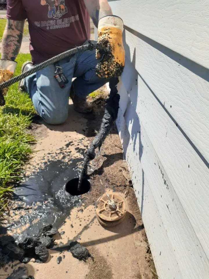 Slide of FM Drain Cleaning & Services