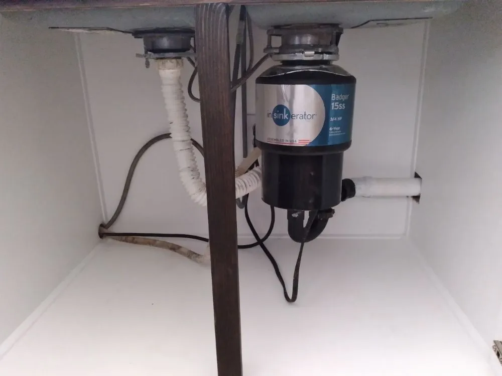 Slide of Garbage Disposal Corona Service