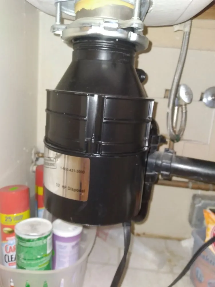 Slide of Garbage Disposal Corona Service