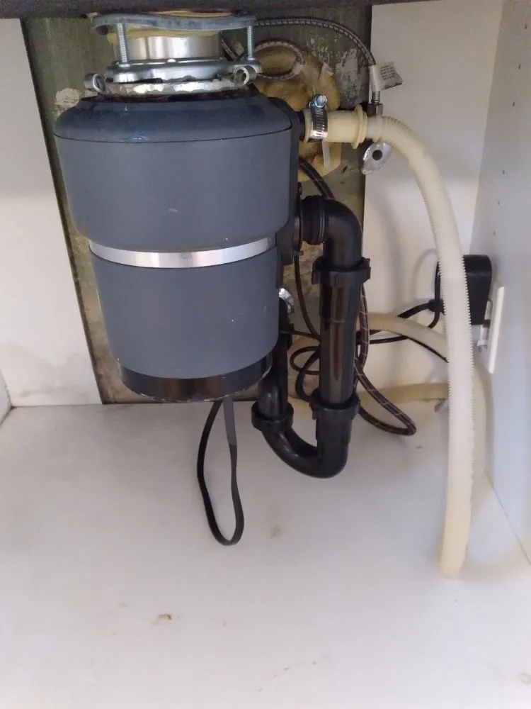 Slide of Garbage Disposal Corona Service