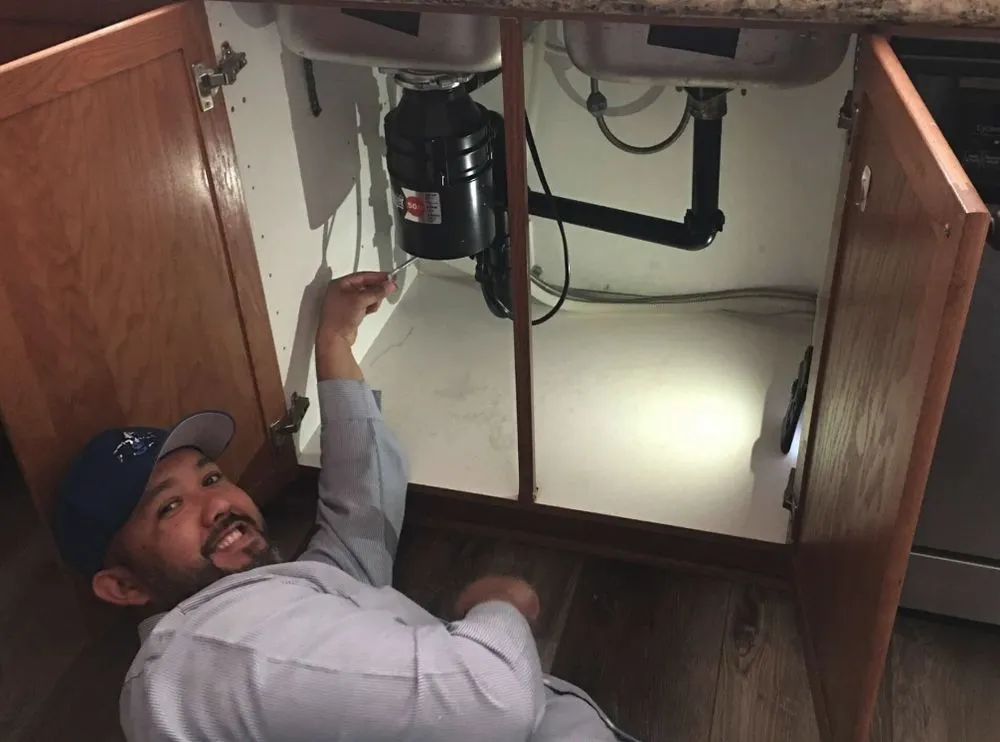 Slide of Garbage Disposal Repairman