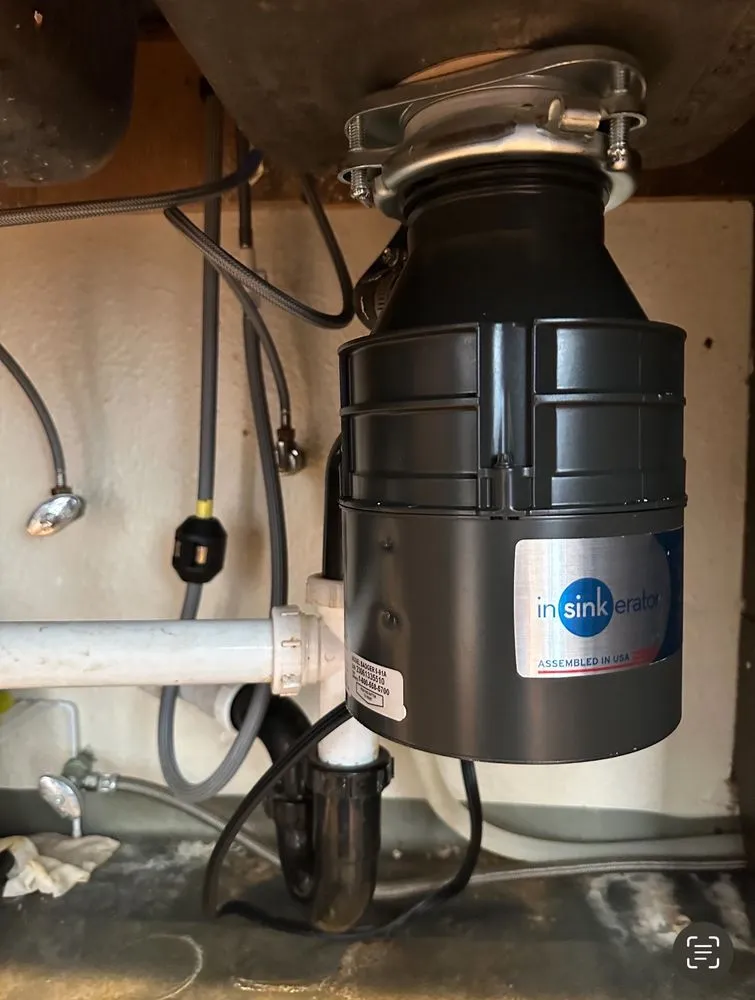 Slide of Garbage Disposal Repairman