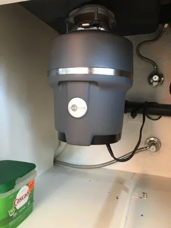 Slide of Garbage Disposal Repairman