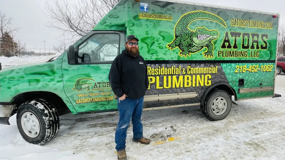 Slide of Gators Plumbing