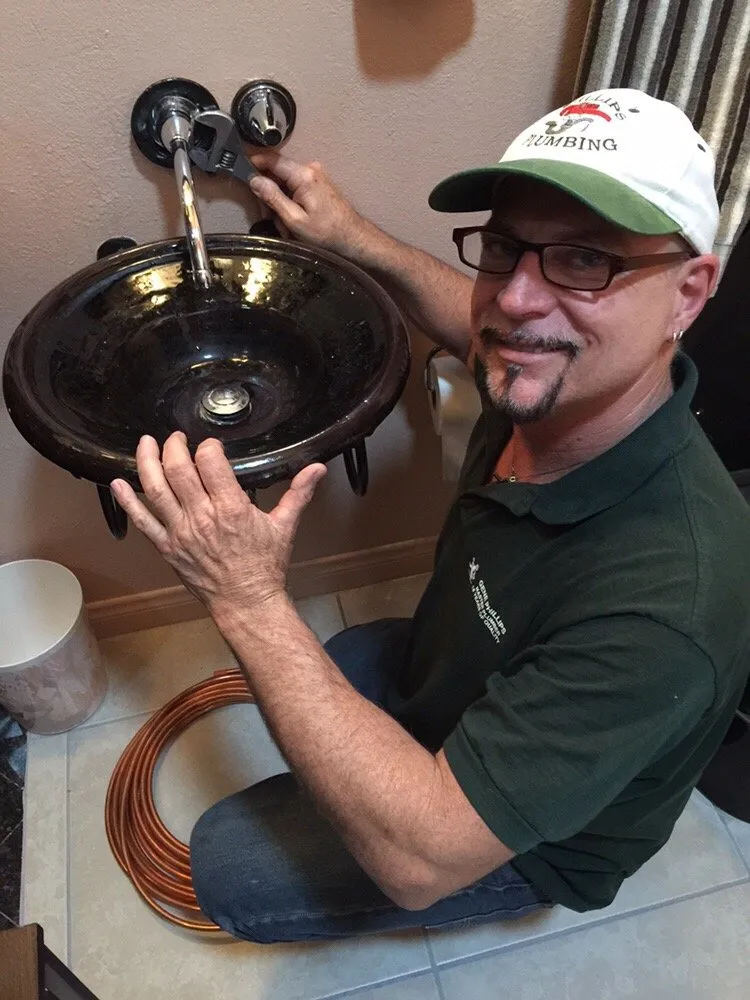 Slide of Gene Phillips Plumbing