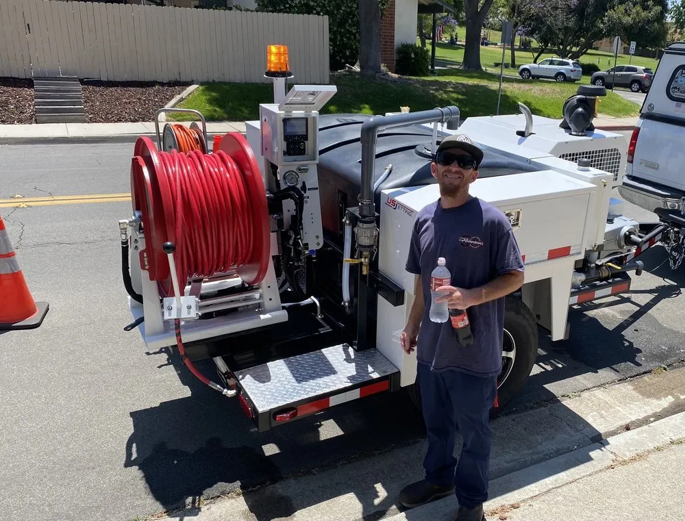 Slide of George Baird Drain Service