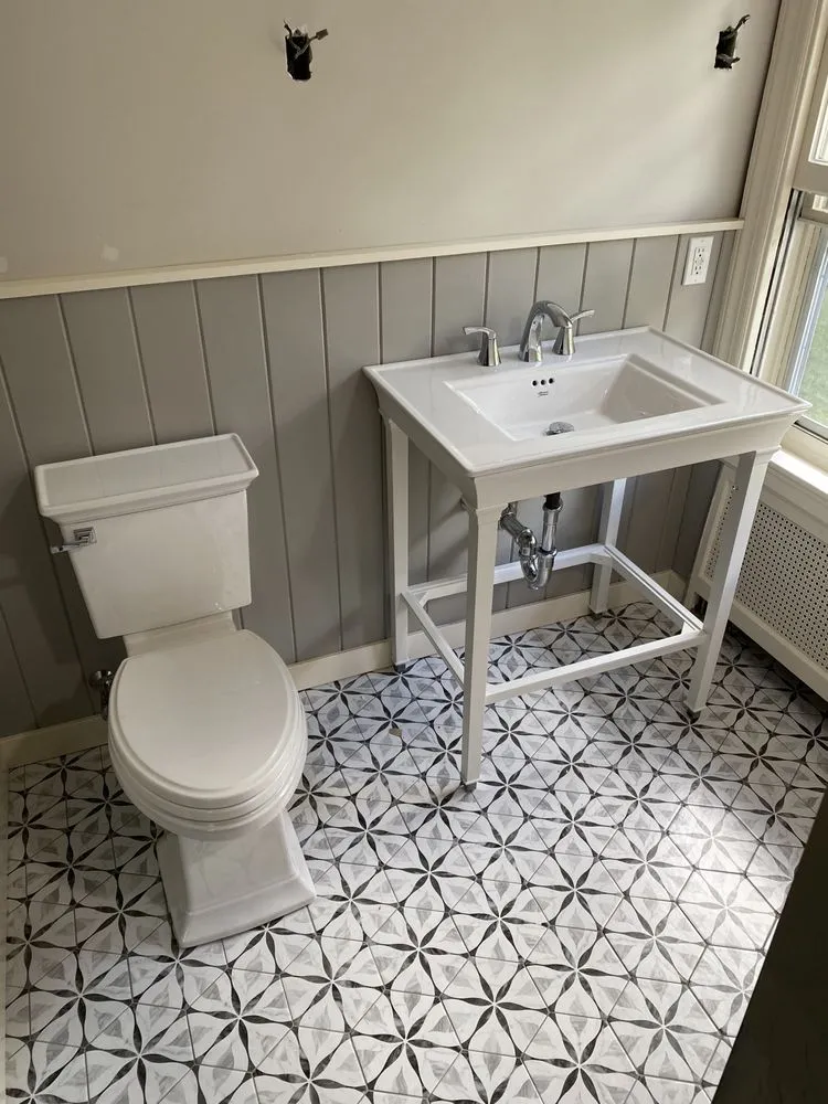 Slide of Ginisi Plumbing