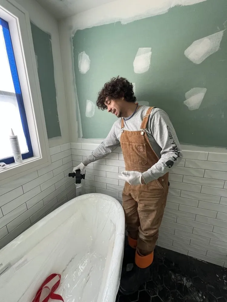 Slide of Glen’s Plumbing