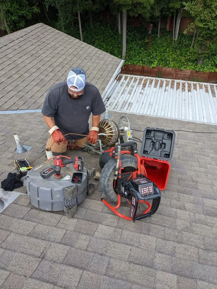 Slide of Gomez Sewer & Drain